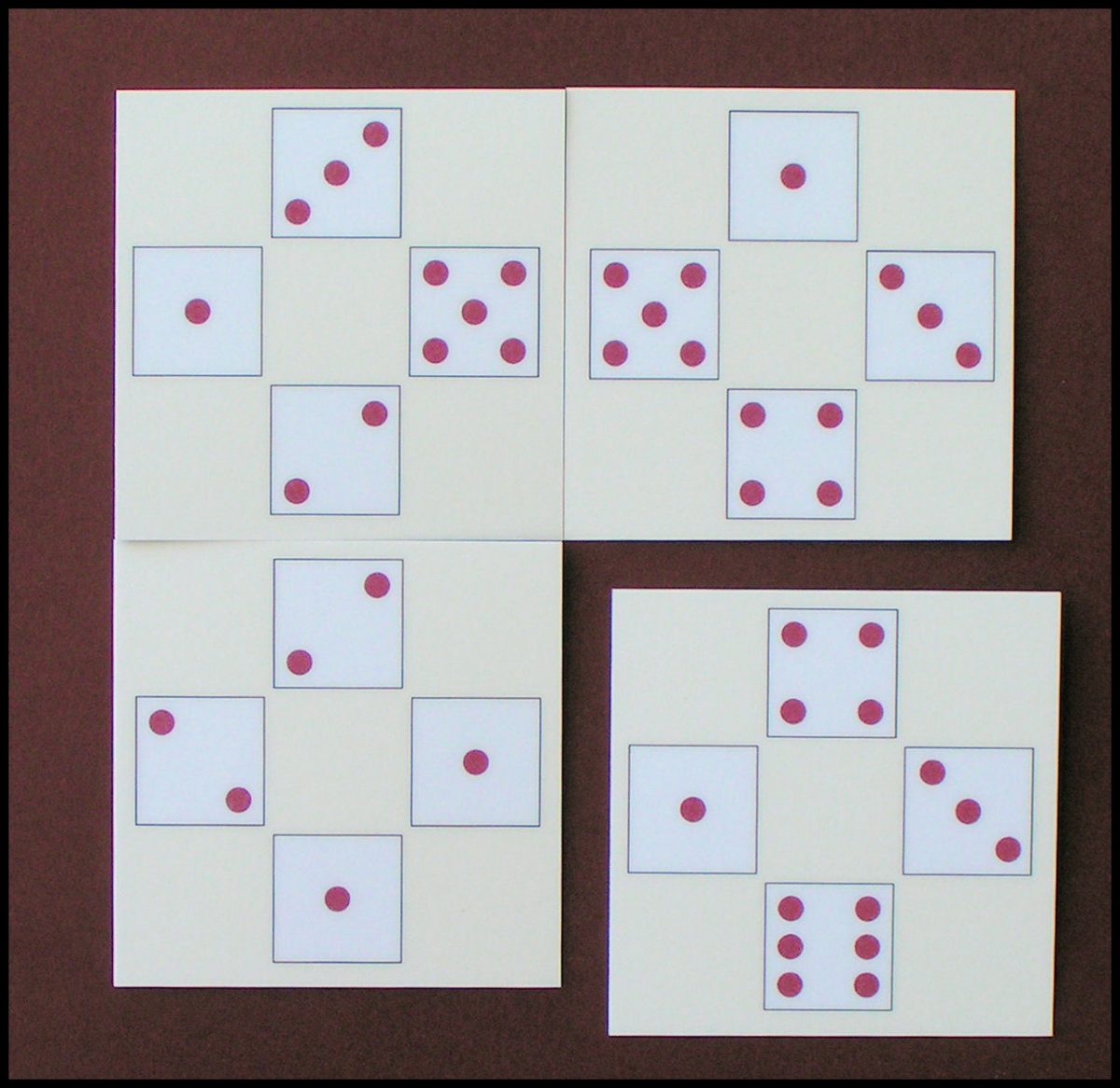 Quadominoes - A Five-Point Tile Play